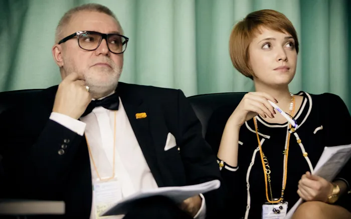 В.В. Макаров и Е.В. Макарова слушают доклады участников